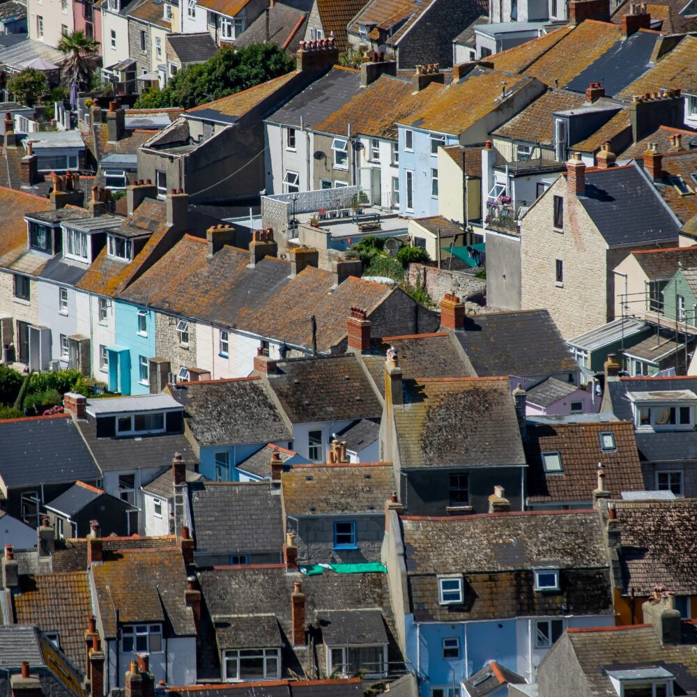 Rooftops of English houses by Pete F on Unsplash