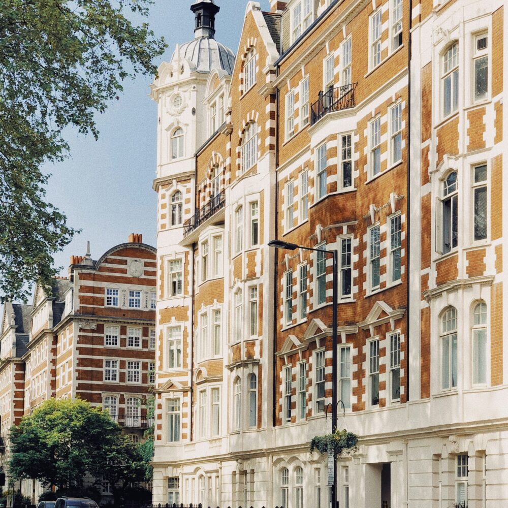 Beige concrete building near green trees, St. Johns House, Saint John's Wood High Street, London, United Kingdom